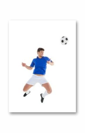 Football player in blue jersey jumping to ball