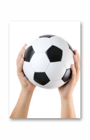 Soccer ball raised by hand