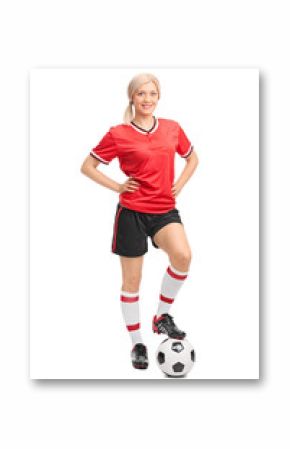Female soccer player posing on white background