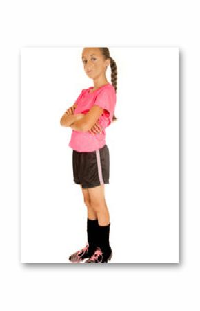 Young girl soccer player standing with her arms folded