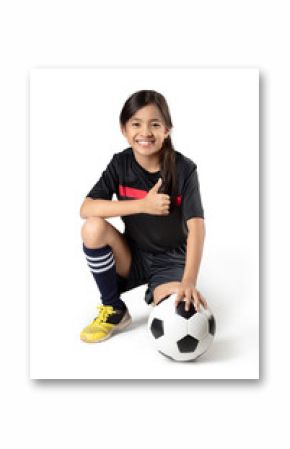 Young asian girl holding soccer ball, Isolated over white