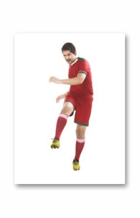 Asian football player kick ball