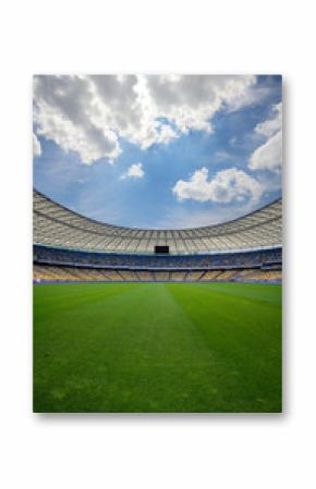 soccer stadium, green grass, blue sky, 