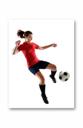 Female Soccer Player Kicking Ball