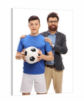 Teenage soccer player posing with his father