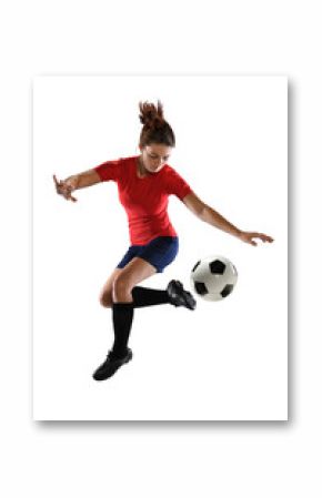 Female Soccer Player Kicking Ball