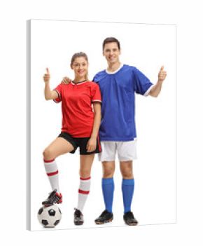 Female and a male soccer players making thumb up gestures