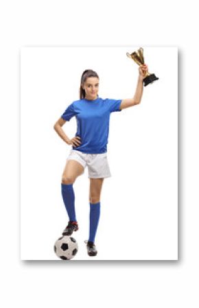 Female soccer player with a football and a golden trophy