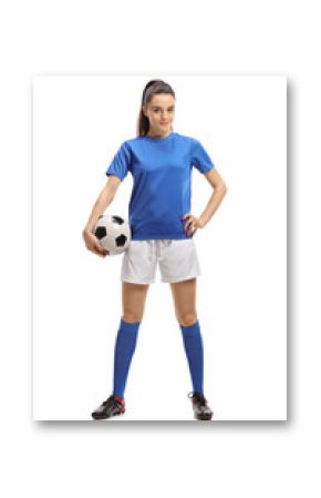 Female soccer player with a football