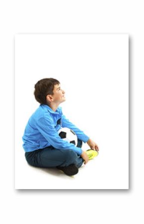 Cute boy is holding a football ball made of genuine leather. Isolated on a white background. Soccer ball
