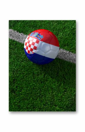 Soccer ball and national flag of Croatia,  green grass