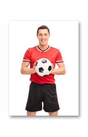 Young football player holding a ball