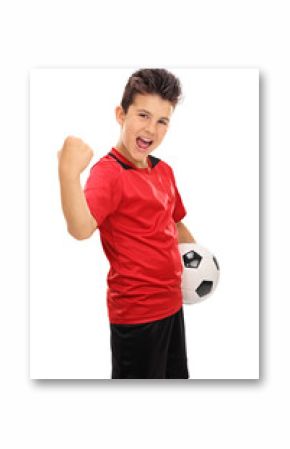 Junior football player with gripped fist