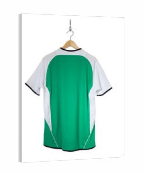 Green Football shirt hanging on hook and isolated on white