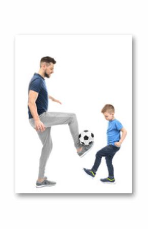 Handsome man and his son playing football on white background