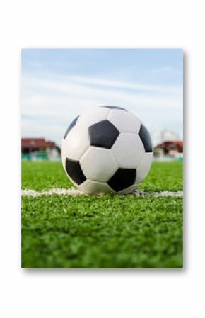 Soccer Football on the green grass of Soccer field.