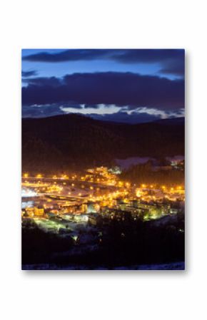 Zimowa panorama w Muszynie w górach. Night landscape of the mountain in Muszyna - Poland. Polish mountain landscape