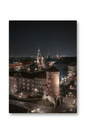 Zamek Królewski na Wawelu w Krakowie widok z drona nocą