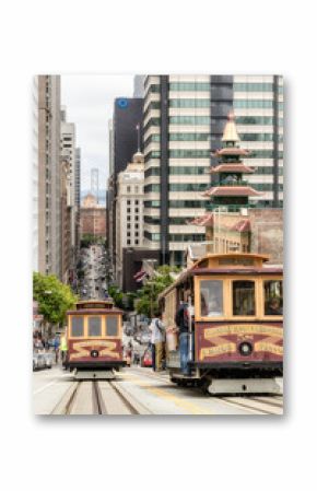 Cable cars traffic in California St., San Francisco