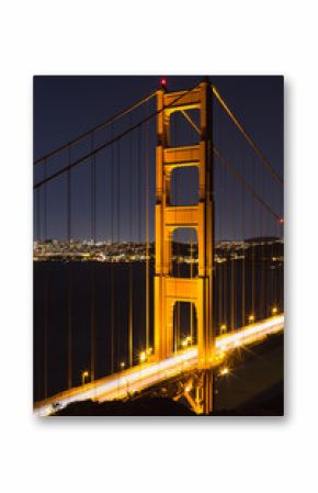 Golden Gate bridge at night looking south with dark sky and ligh