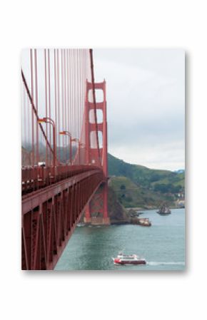 San Francisco, California, USA - APRIL 22, 2016:  Ferry ship under Golden Gate Bridge, documentary editorial.
