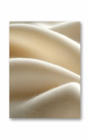 Close-up of Cream Colored Soft Fluffy Wool Fabric with Smooth Curves and Delicate Texture
