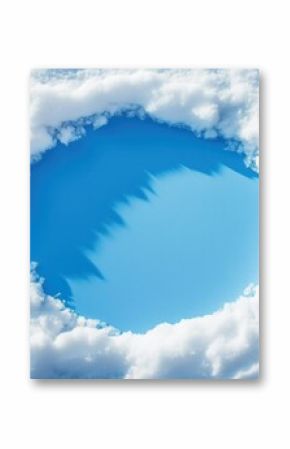 Circular white snow frame against a clear blue sky creates a serene winter scenery
