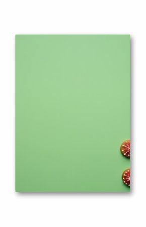 Christmas gingerbread cookies with red and white icing on a green background
