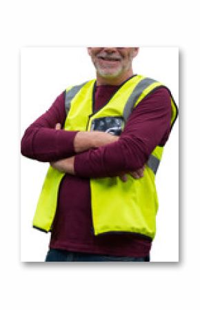 Confident senior worker with arms crossed wearing reflective clothing