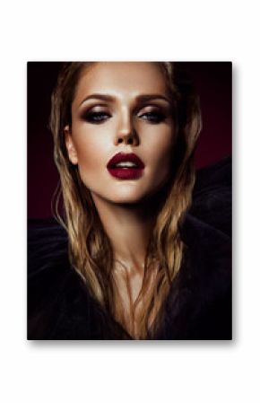 Close-up portrait of beautiful woman with bright make-up