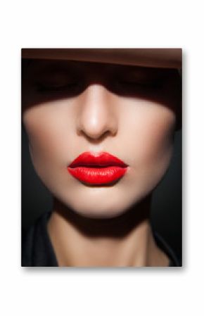 Close-up of model with red lips and perfect skin