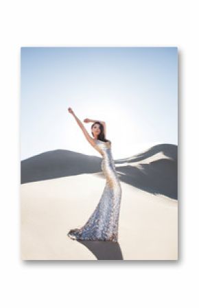 Beautiful asian female model in luxury shiny dress in desert