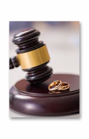 Judge gavel deciding on marriage divorce