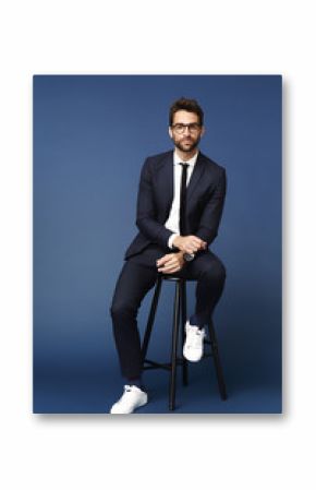 Portrait of smart man in suit, studio