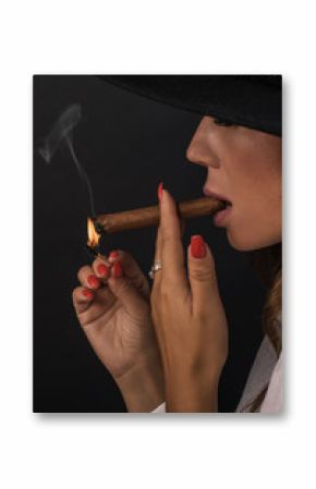 Portrait of sexy elegant lady woman with hat smoking cigar