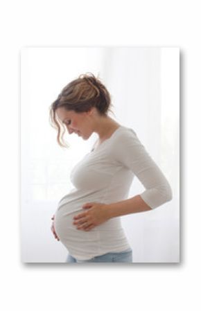 Pregnant woman touching belly