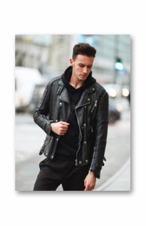 Portrait of man look around. Stylish clothing wear. Autumn and winter weather. Jacket with white sneakers. Blur background, proffesional photo.