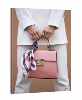 Model with bag outdoors