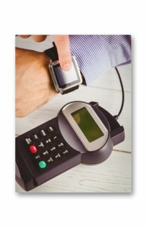 Man using smart watch to express pay