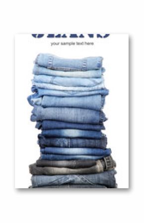 Many jeans stacked in a pile isolated on white