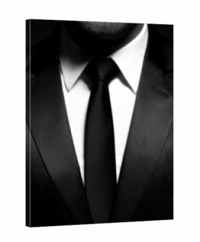 Man gentleman in black suit and tie
