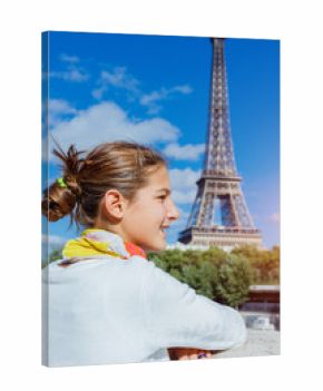 Beautiful girl in Paris with Eiffel tower