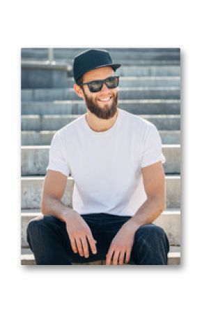 Hipster handsome male model with beard  wearing white blank  t-shirt with space for your logo