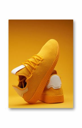 Pair of yellow sport shoes