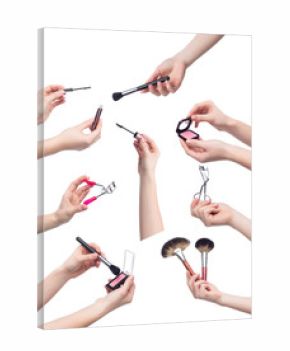 Collection of makeup cosmetics in hands on white background