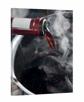Red wine poured into a pot