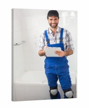 Plumber taking notes on clipboard