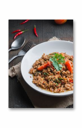 fried pork with basil leaves