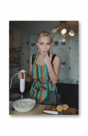 Young girl prepares dessert