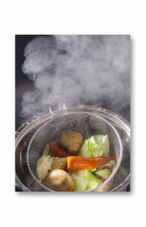 cooking vegetables steamed in a pot